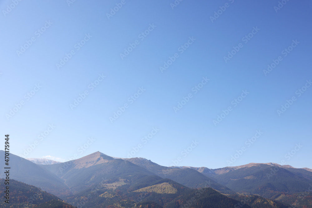 Beautiful mountain landscape with forest on sunny autumn day Beautiful mountain landscape with forest on sunny autumn day