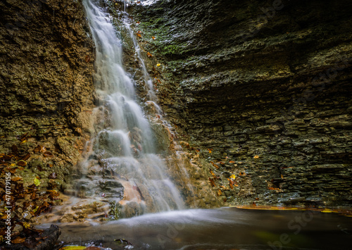 A small waterfall in rautal close to jena in thuringia at autumn