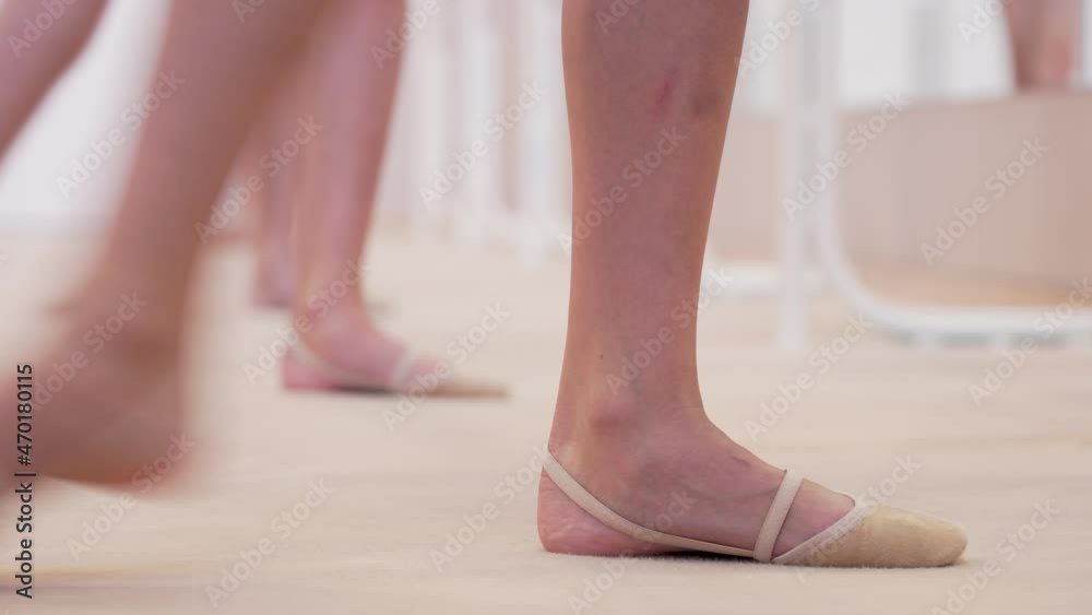 Young gymnasts perform ballet exercices during choreography training Young gymnasts perform ballet exercices during choreography training