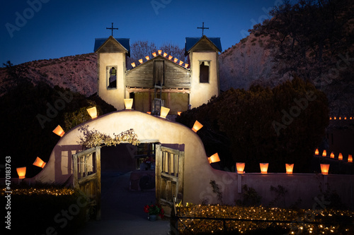 Christmas at a lantern candlelit chapel sanctuary in the hills of New Mexico photo