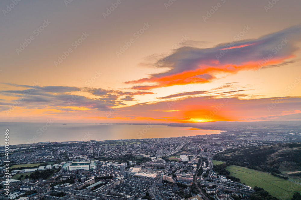 Aerial view of sunrise Edinburgh's largest park offers so much for visitors, climb to Arthur's Seat for stunning views of the city, explore the castle where Scottish kings lived or visit museums