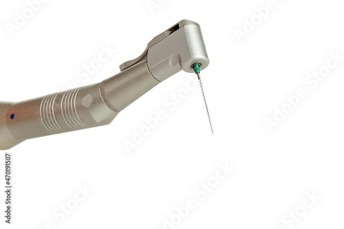 Dental tip handpiece with a tool for root canal treatment, endodontic treatment, file expander, dental filling, isolated on a white background photo