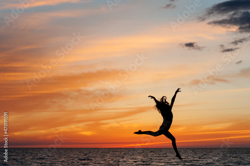 A Young Woman Girl Child Kid Lady Jumping Dancing Silhouette Sky Orange Sunset Beauty Beautiful Fun Exciting Exhilerating Get Outside Beach Water Sun 