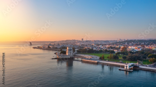 Aerial view of the Portuguese Historical Folk Patrimony, Belem Tower, on the Tagus River. During sunset. © sergojpg