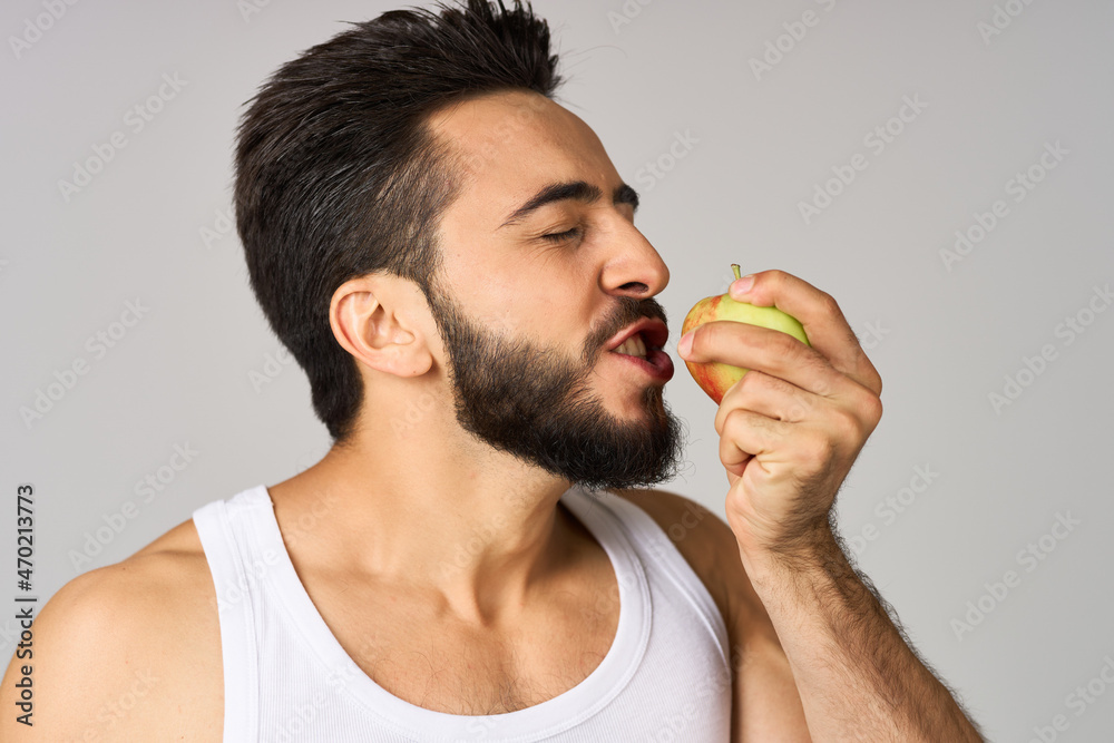 Cheerful man fruit food diet strength studio lifestyle Cheerful man fruit food diet strength studio lifestyle