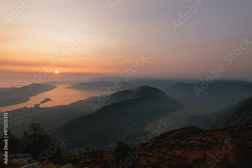View from Mount Lovcen to the setting sun over the bay. Montenegro