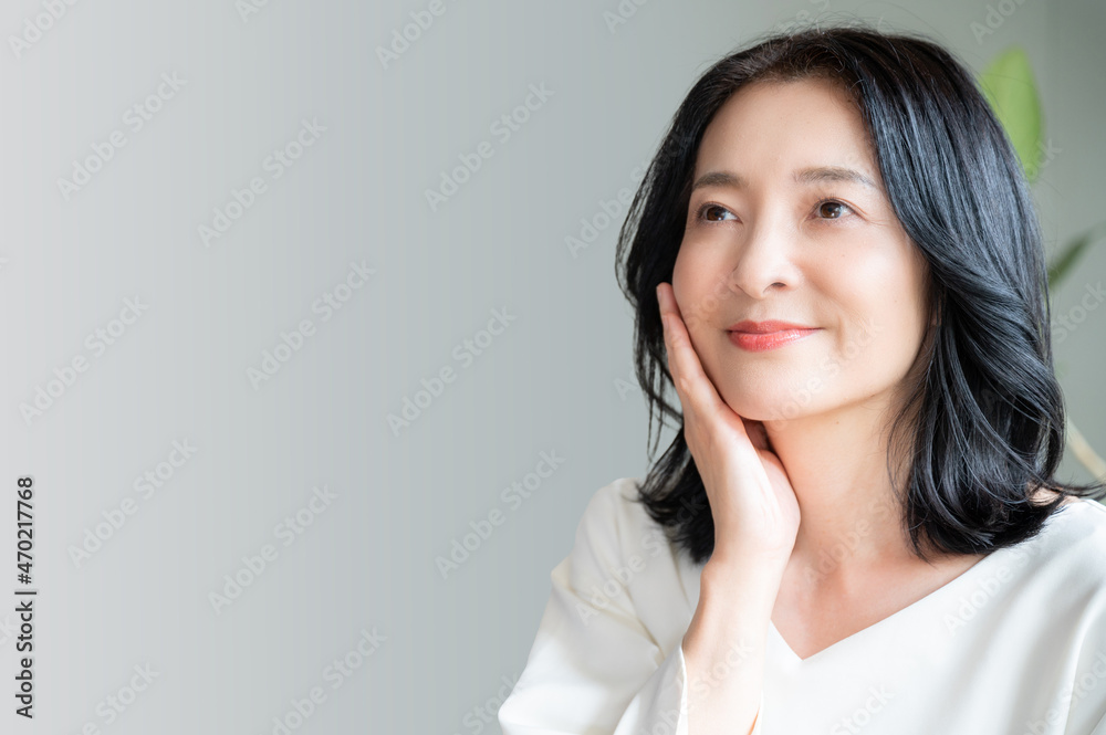 Beautiful Asian (Japanese) woman looking up Close-up Copy Space Beautiful Asian (Japanese) woman looking up Close-up Copy Space