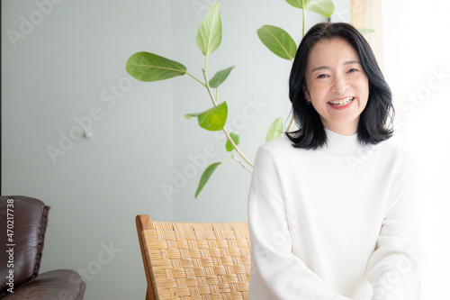 Bild auf Leinwand portrait of a person Asian beautiful  (Japanese) woman relaxing looking at camer