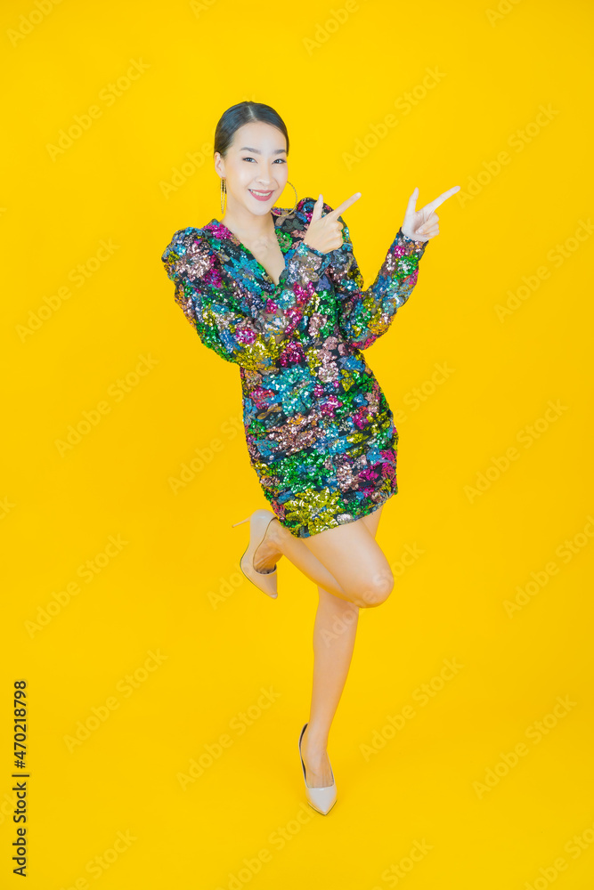 Portrait beautiful young asian woman smile with action Portrait beautiful young asian woman smile with action
