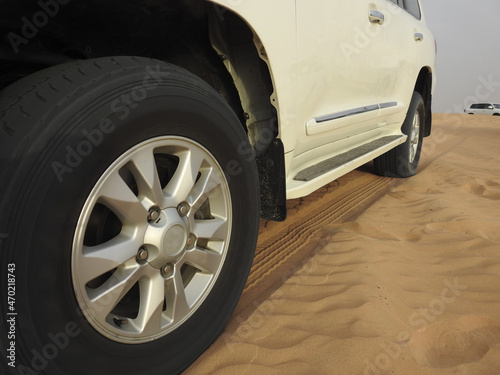 off-road vehicle drive through sand dunes