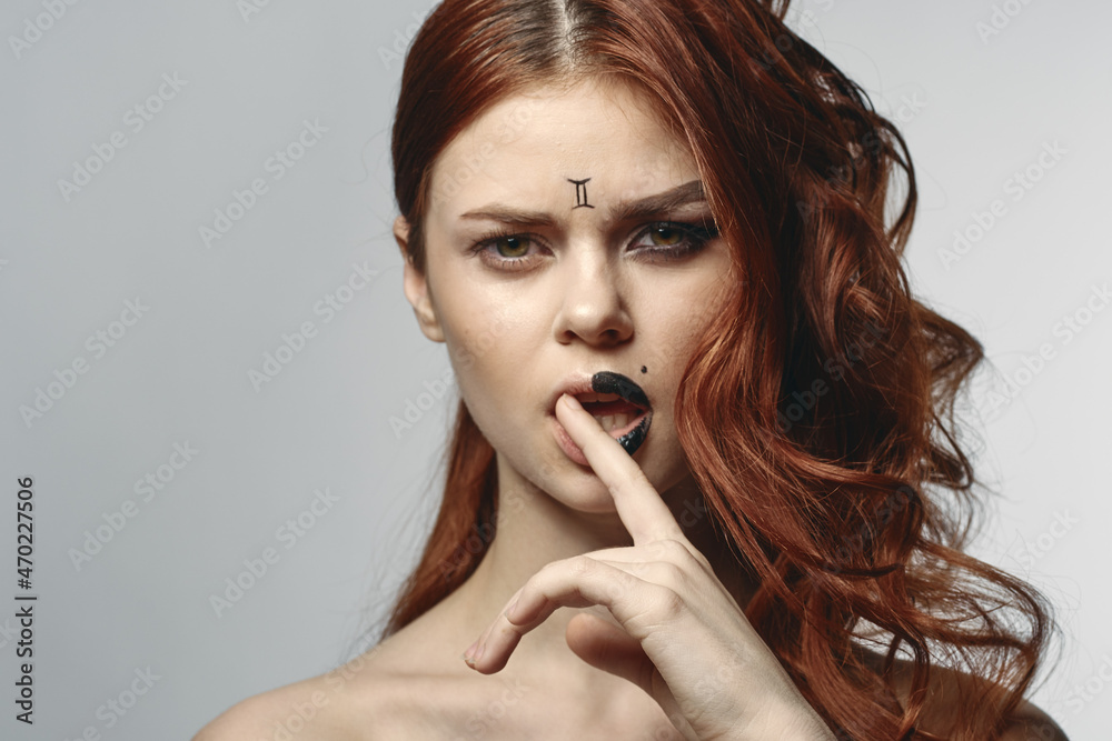 red-haired woman naked shoulders cosmetics horoscope close-up red-haired woman naked shoulders cosmetics horoscope close-up