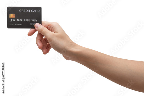 Woman hand holds black credit card isolated on white background.	