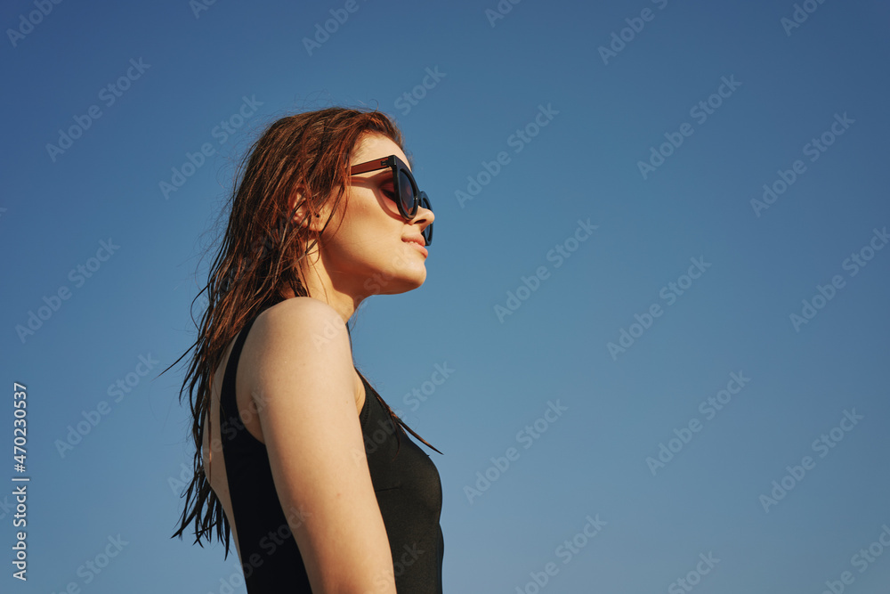 woman in black swimsuit sunglasses sun nature woman in black swimsuit sunglasses sun nature