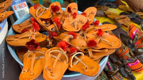 Traditional footwear from Kolhapur, India. Kolhapuri chappal. Handmade leather slippers 