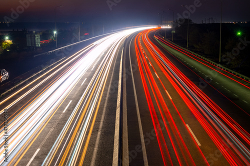 Night Car Traffic With Trails on a Suburban Highway
