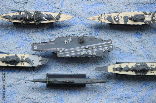 Slika na platnu The lineup of miniature battleships consists of the enterprise carrier, the subm