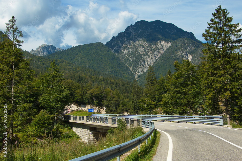 Fototapeta premium Road bridge at the lake Lago del Predil, Tarvisio, Italy 