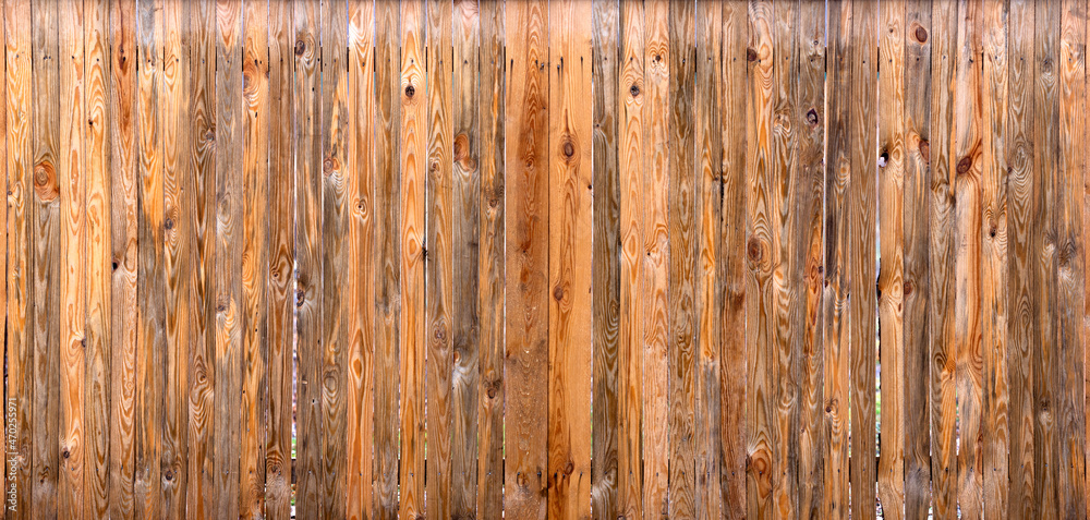 Obraz premium The yellow plank wall is aged naturally.