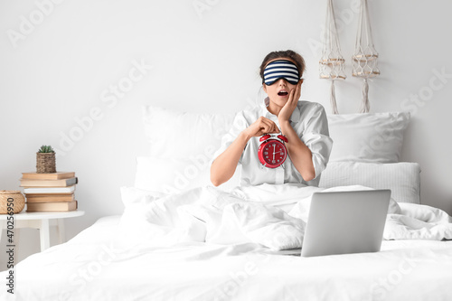 Surprised woman with sleepi...