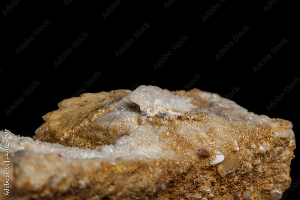 Macro mineral stone Snow quartz with calcite on a black background Macro mineral stone Snow quartz with calcite on a black background