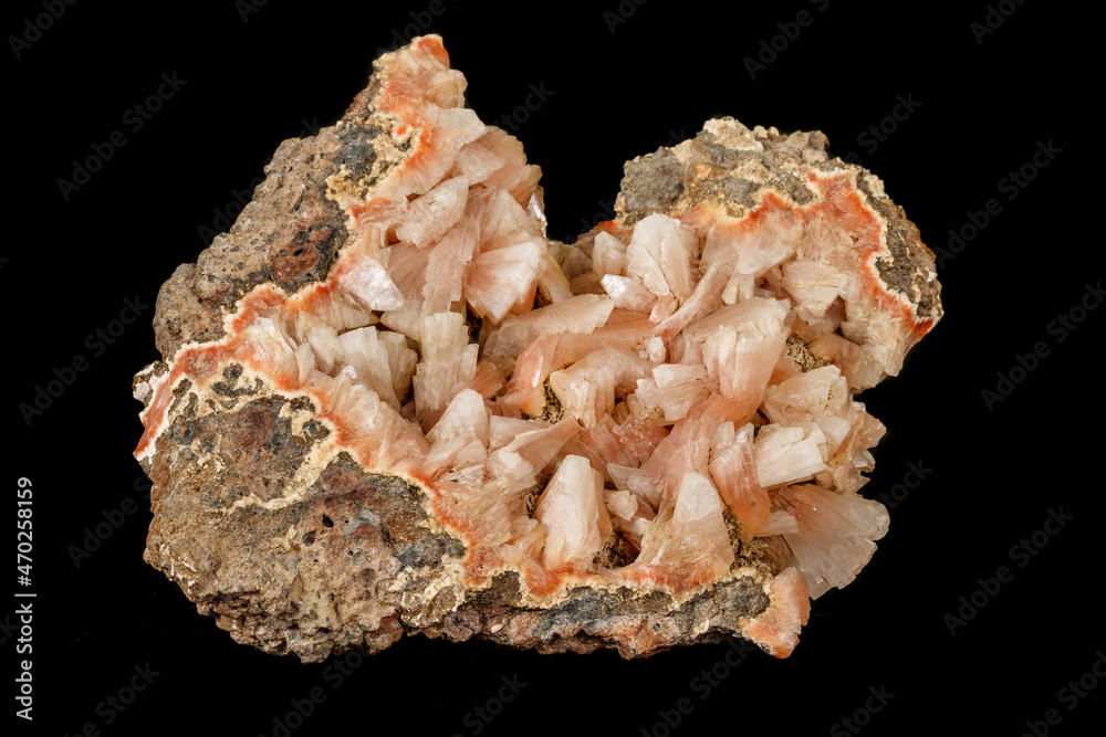 Macro of a stone Stilbite mineral on a black background Macro of a stone Stilbite mineral on a black background
