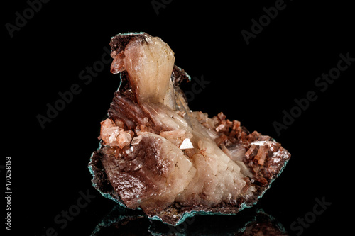 Macro of a stone Albite mineral on a black background photo