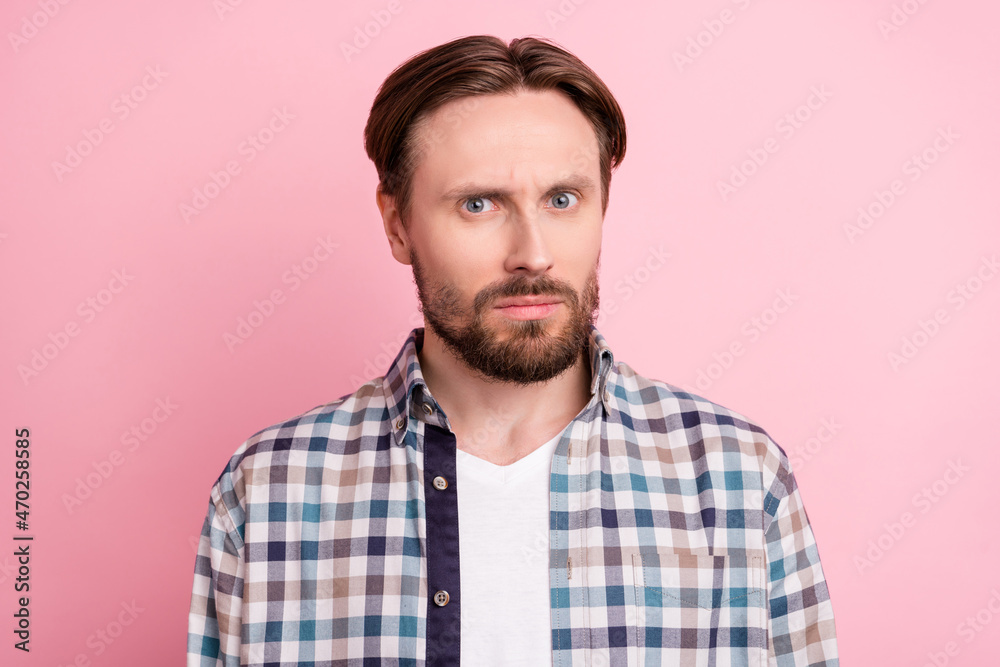 Photo of young man unhappy upset amazed shocked information frustrated isolated over pink color background Photo of young man unhappy upset amazed shocked information frustrated isolated over pink color background