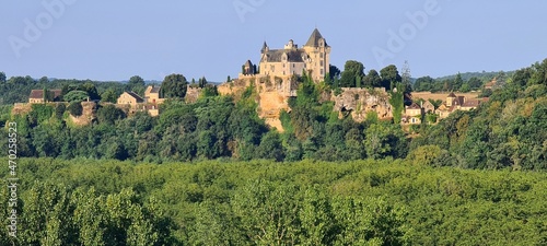 Chateau de Castelnaud next to the Dordogne river, Aquitaine, France photo