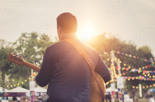 jazz musician playing outdoor concert	 	 photo