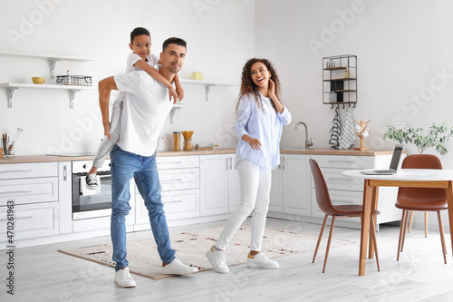 Happy interracial family in...