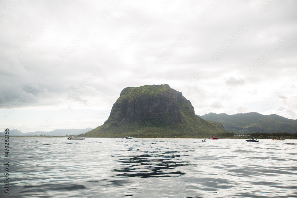 View of the mountain Le Morne from the ocean in Mauritius. View of the mountain Le Morne from the ocean in Mauritius.