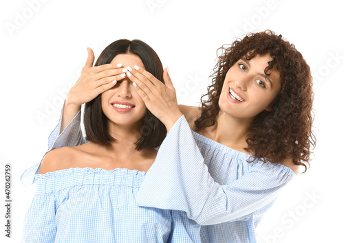 Young woman closing eyes to...