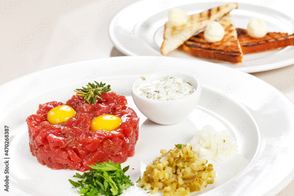 tasty tartare with sauce and pickles tasty tartare with sauce and pickles
