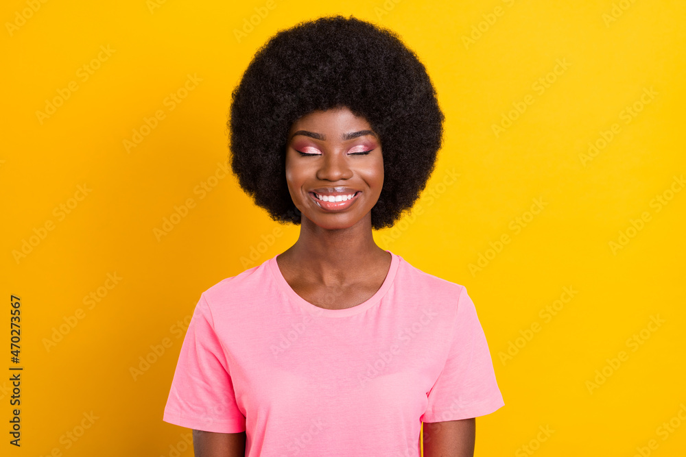 Photo of young attractive black girl happy positive smile dream dreamy isolated over yellow color background