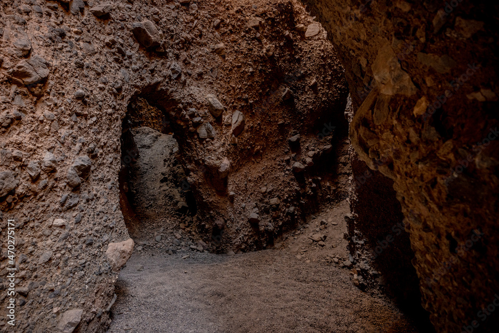 Obraz premium Archway Creates A Small Door Into Another Chamber Of A Slot Canyon