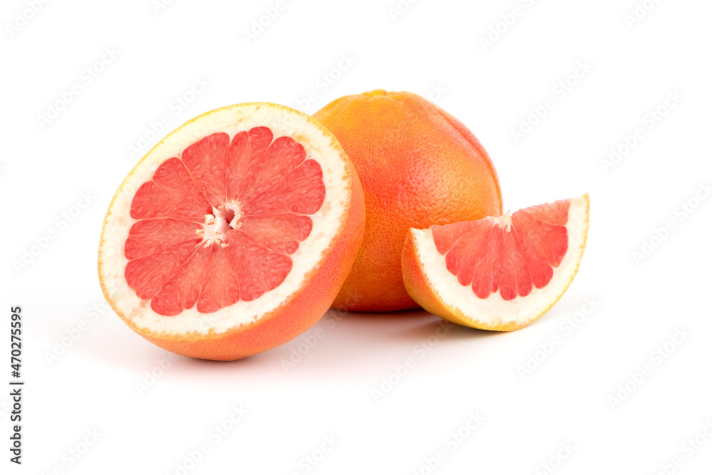 Fresh tasty grapefruit, whole and cut exotic fruit, citrus fruits, healthy fruit, close-up isolated Fresh tasty grapefruit, whole and cut exotic fruit, citrus fruits, healthy fruit, close-up isolated
