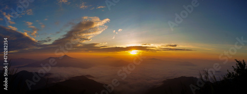 Beautiful mountain range in the morning and sunrise at Doi Pha Tang, Chiang Rai, Thailand