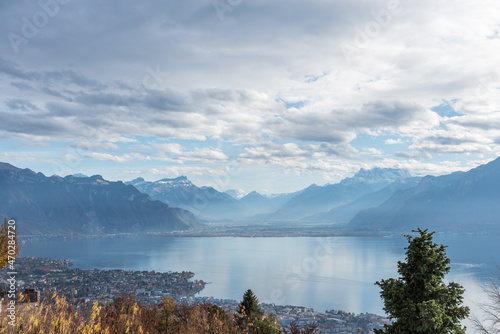 Panoramic view of Lake Geneva, Vevey and the Swiss Alps from Mont Pelerin. Travel and tourism concept.