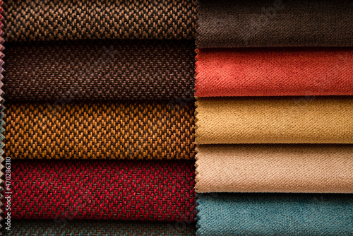 Colored textured fabric up close, catalog of fabrics for production of upholstered furniture - sofas, chairs, soft corners