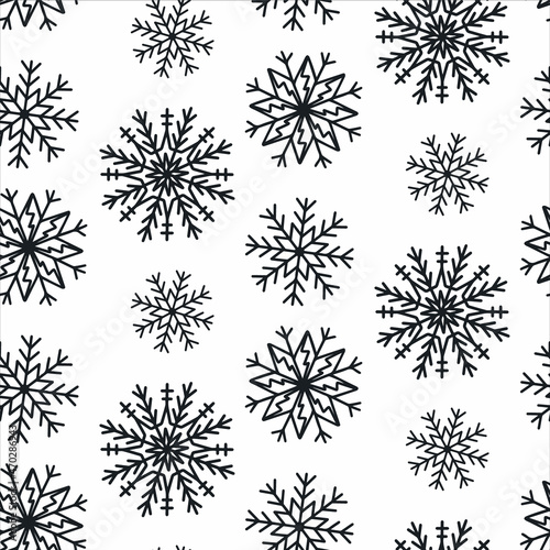 Cute Christmas seamless pattern with snowflakes isolated on white background. Happy new year wallpaper and wrapper for seasonal design  textile  decoration  greeting card. Hand drawn prints and doodle