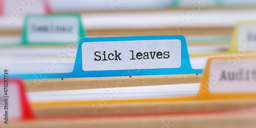 File folders with a tab labeled Sick Leaves