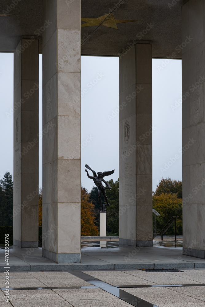 Plombieres, Belgium - November 1, 2021: Henri-Chapelle American Cemetery and Memorial. Many of the burial are from  Ardennes winter offensive (Battle of the Bulge). Autumn rainy day. Selective focus.