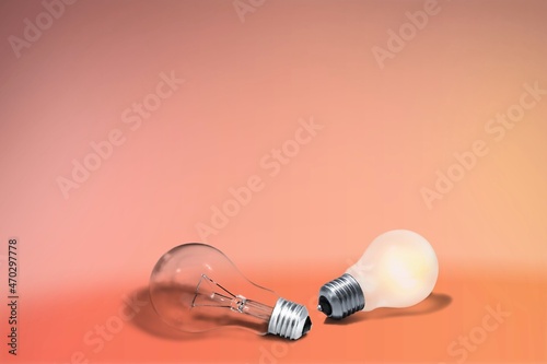 Breast Cancer Awareness Month. Two electric light bulbs on a background.