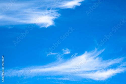 Blue sky with white clouds. Heavenly landscape background.
