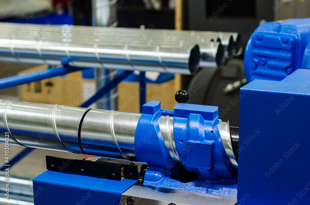 Pipe forming machine at the factory Pipe forming machine at the factory