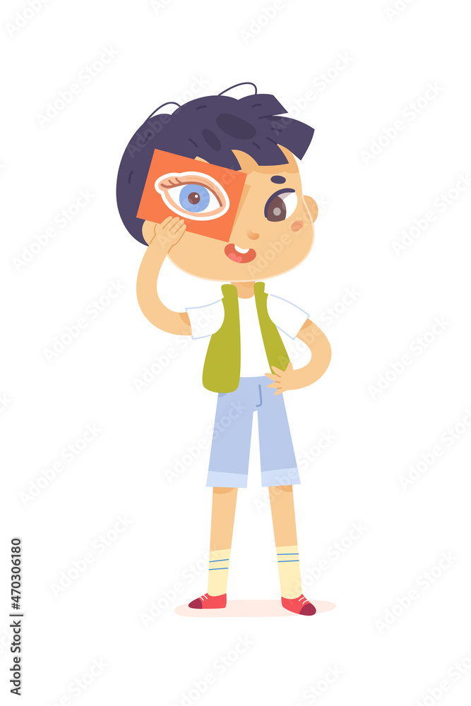 Boy learning sight sensory sense, holding card with human eye in hand, studying vision Boy learning sight sensory sense, holding card with human eye in hand, studying vision