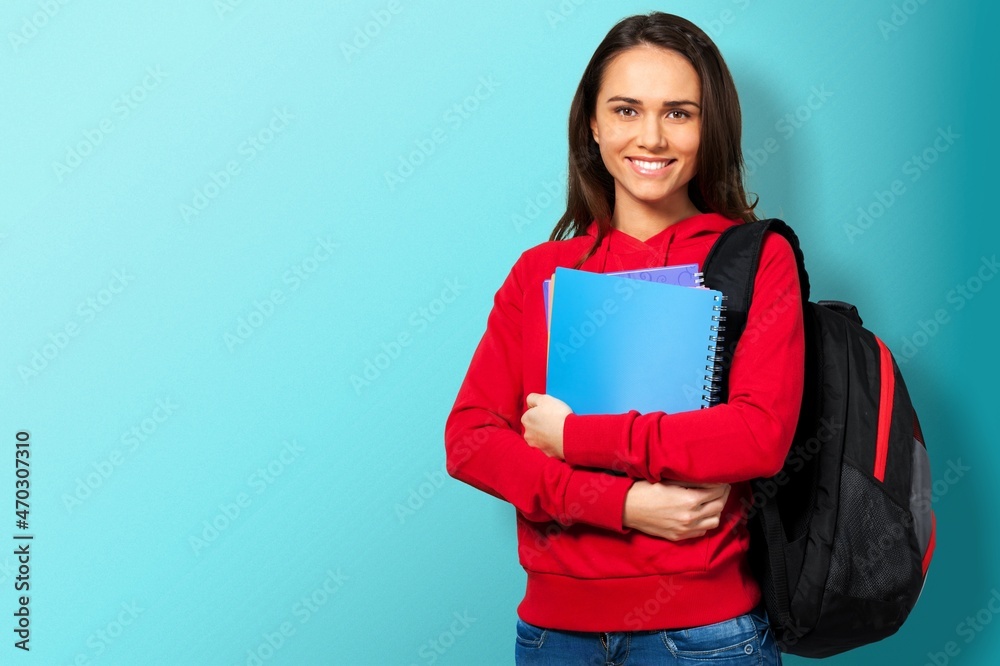 Happy Student. Cheerful Girl Smiling To Camera Standing With Backpack Happy Student. Cheerful Girl Smiling To Camera Standing With Backpack