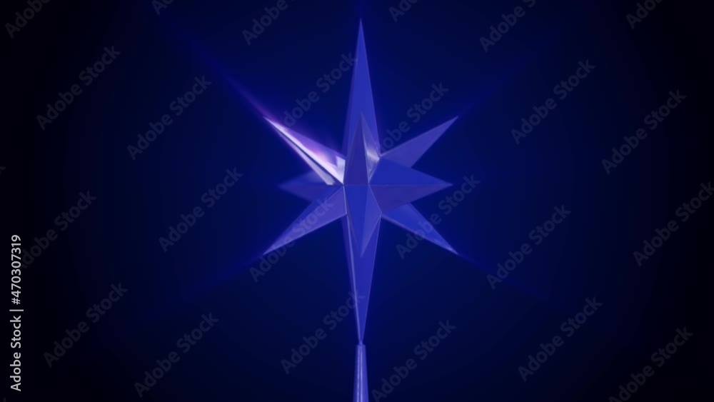 Crystal Bethlehem star tree topper on dark blue background Crystal Bethlehem star tree topper on dark blue background