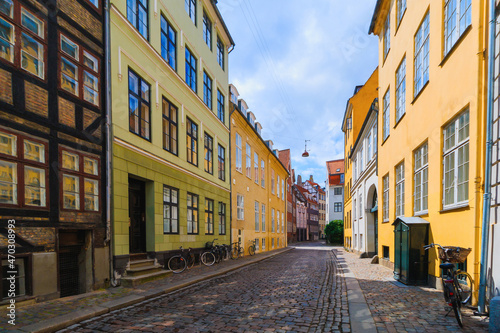 Fototapeta Naklejka Na Ścianę i Meble -  Advertisement free street - Copenhagen colorful old town street at summer season