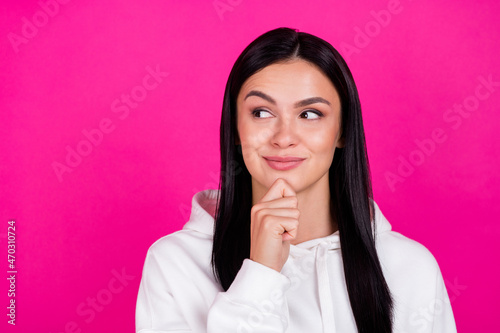 Photo of young lovely lady hand touch chin minded thoughtful curious look empty space isolated over magenta color background